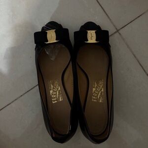 Ferragamo Black Heels with Gold Accent